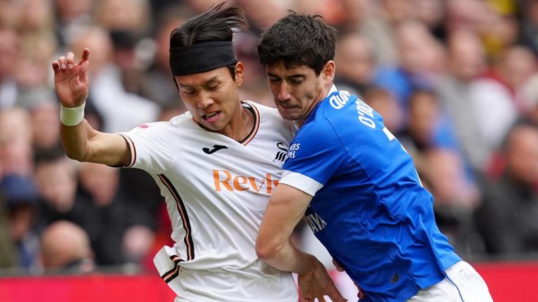 Eom Ji-Sung is tackled by Callum O'Dowda