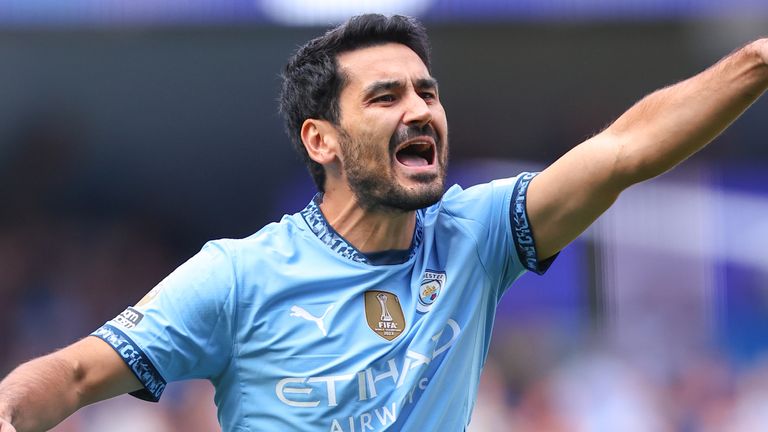 Substitute Ilkay Gundogan shouts instructions to his team-mates